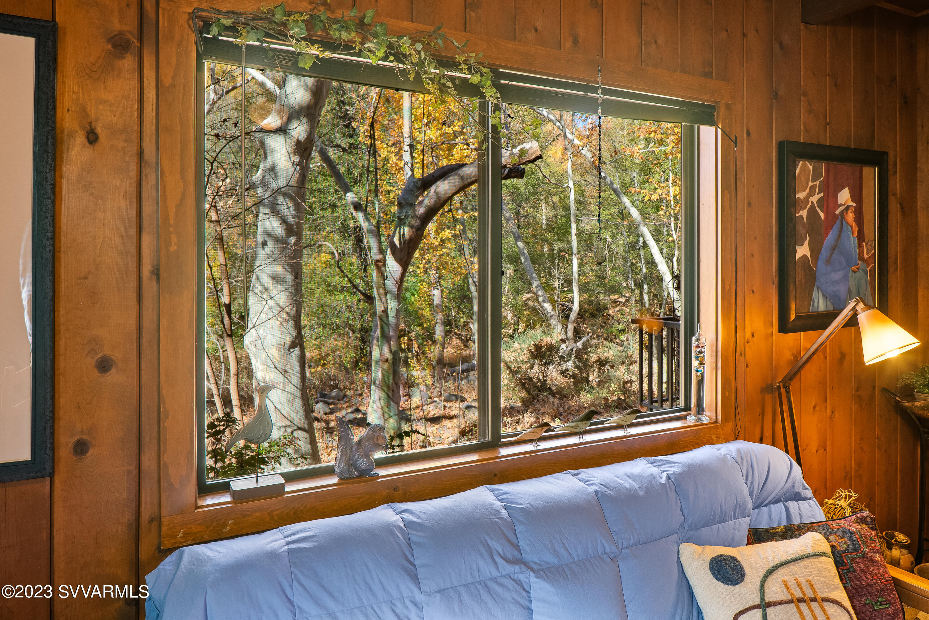 45 Copper Cliffs Lane Sedona, AZ 86336 - Photo 18 of 39 a bedroom with a bed and a window with outer view