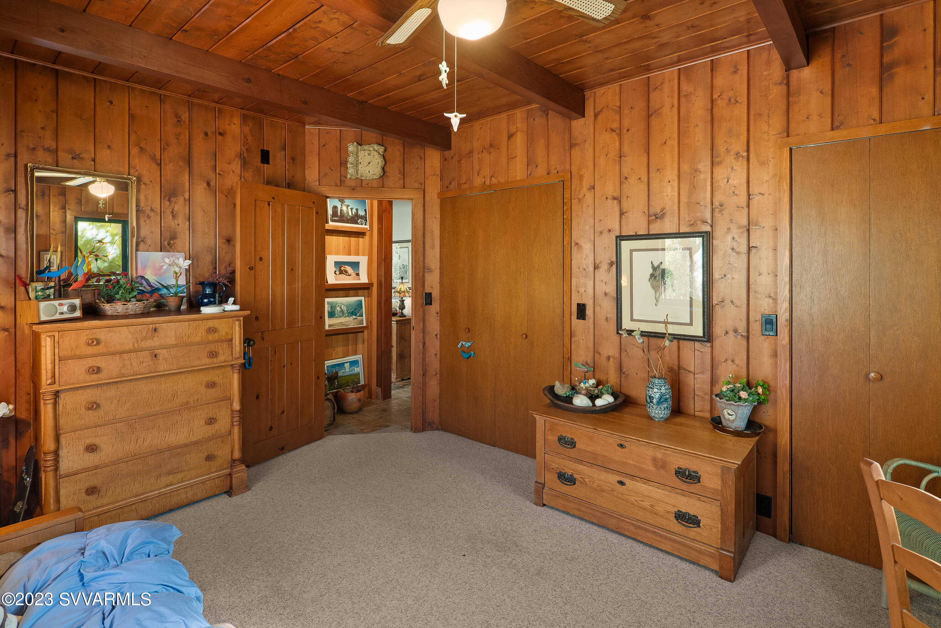 45 Copper Cliffs Lane Sedona, AZ 86336 - Photo 19 of 39 a room with furniture and mirror
