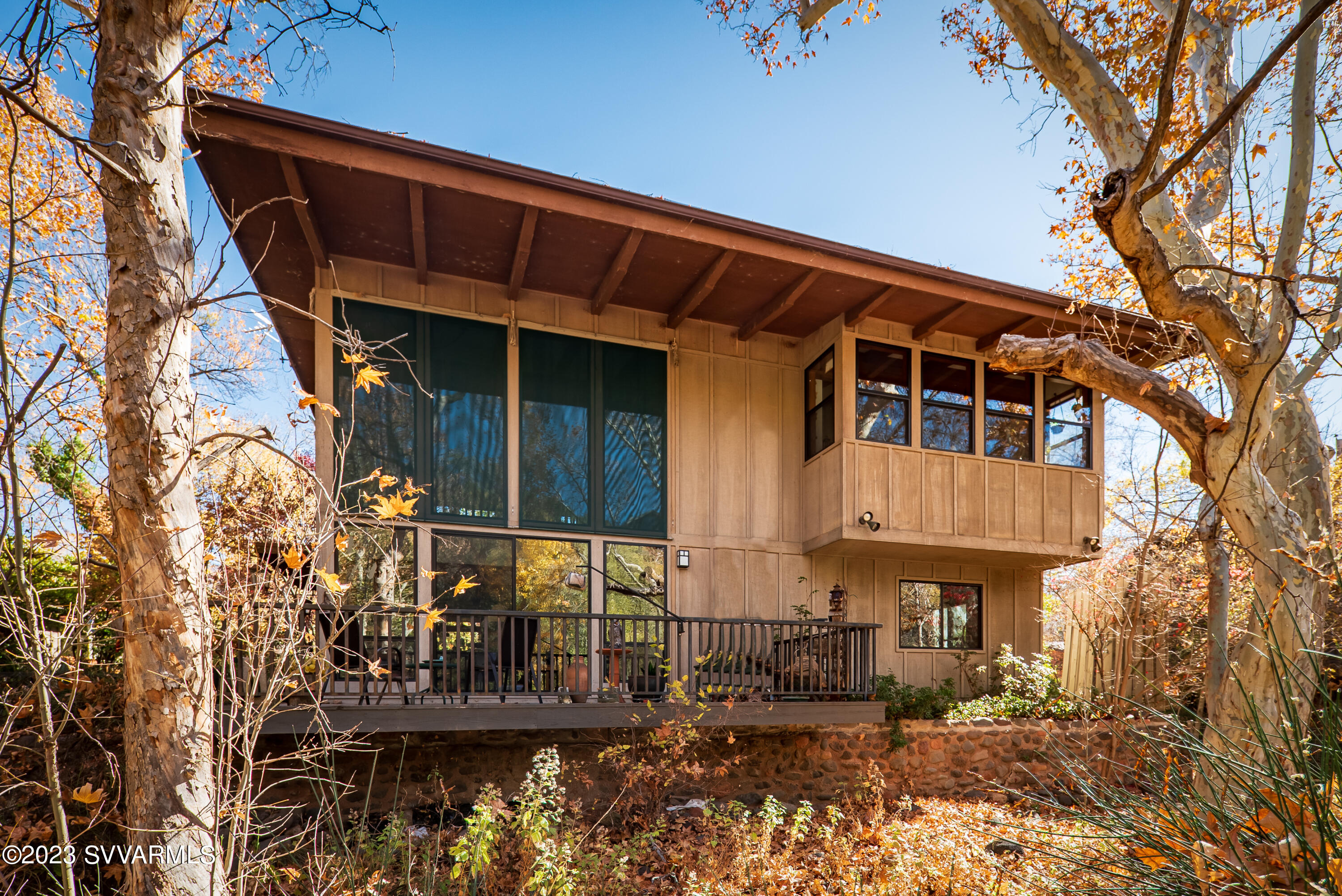 45 Copper Cliffs Lane Sedona, AZ 86336 - Photo 4 of 39 a front view of a house with street