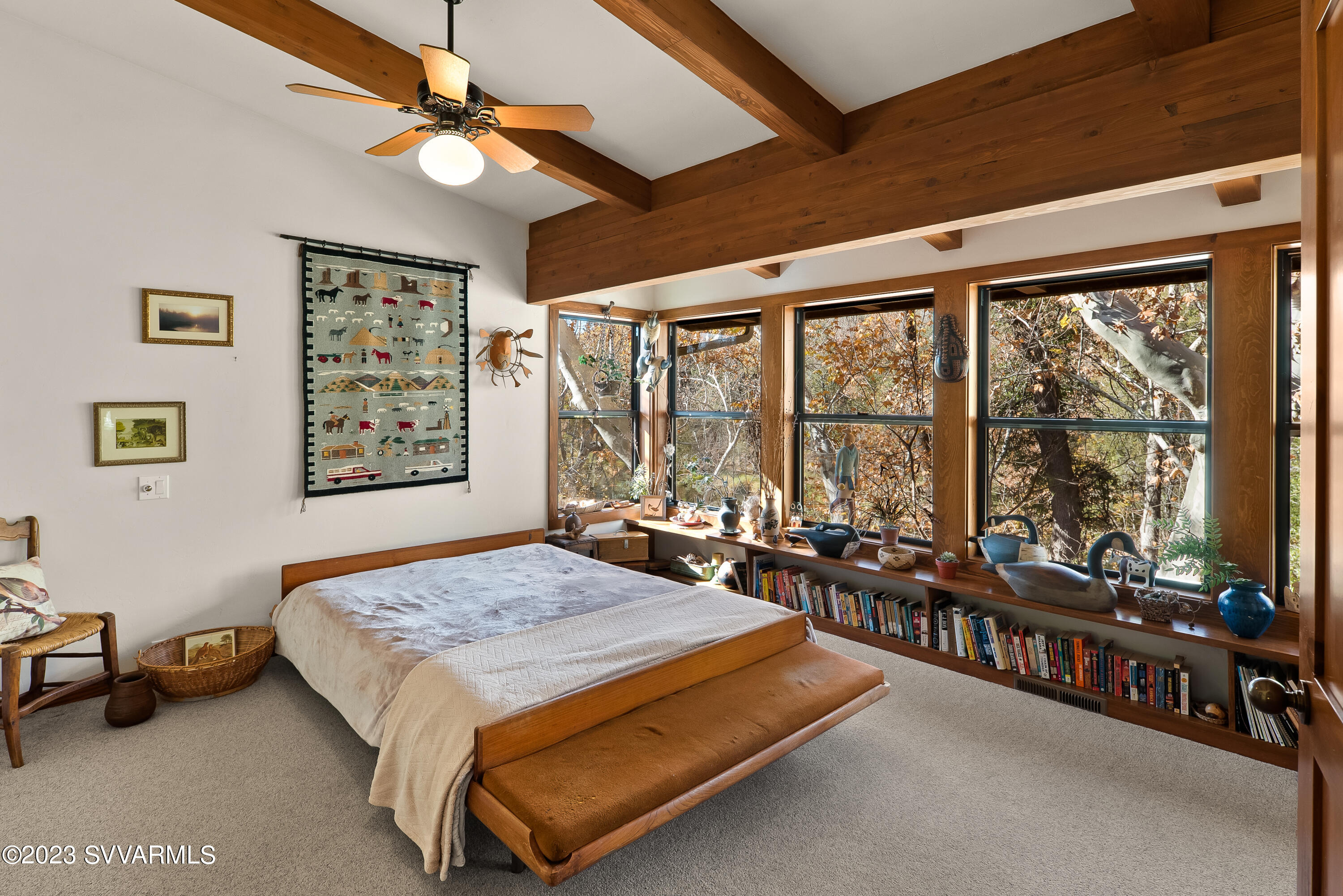 45 Copper Cliffs Lane Sedona, AZ 86336 - Photo 10 of 39 a bed room with a bed and a large window