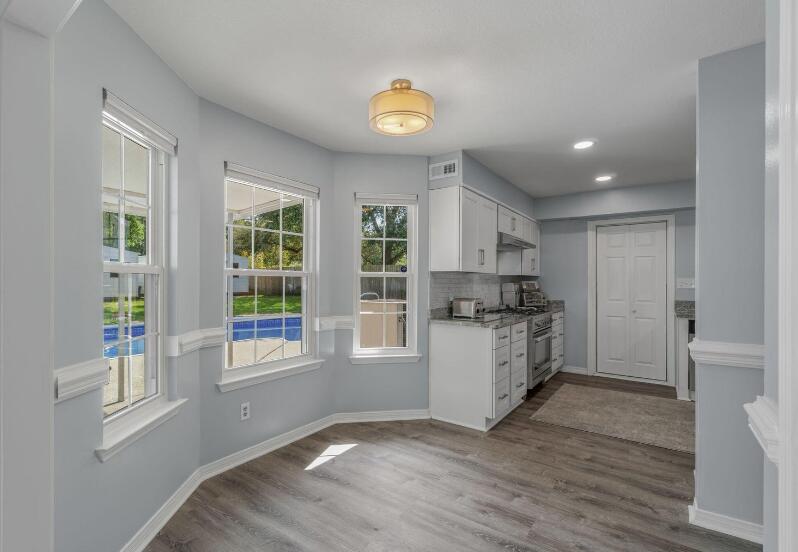 14 Winfield Way Mary Esther, FL 32569 - Photo 12 of 46 a kitchen with a refrigerator and a stove top oven