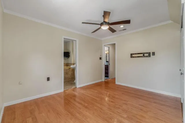 a room with a sink and a mirror