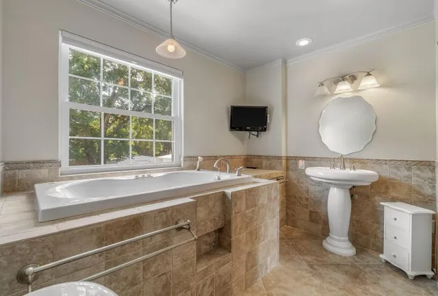 a bathroom with a sink and a toilet