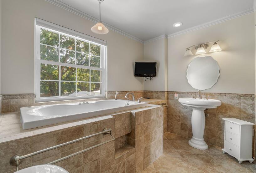 14 Winfield Way Mary Esther, FL 32569 - Photo 35 of 46 a room with a sink and a mirror