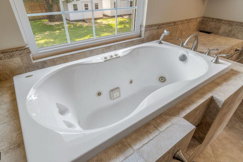 14 Winfield Way Mary Esther, FL 32569 - Photo 37 of 46 a bath tub sitting next to a window