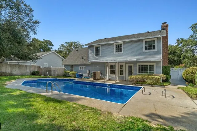 a view of a house with a big yard