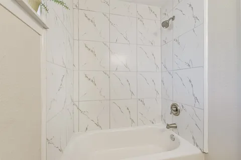 a bathroom with a bathtub