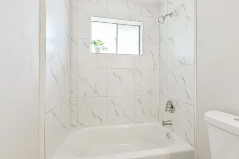 a bathroom with a bathtub