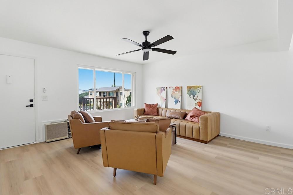 895 Jamacha Road El Cajon, CA 92019 - Photo 5 of 33 a living room with furniture and a ceiling fan