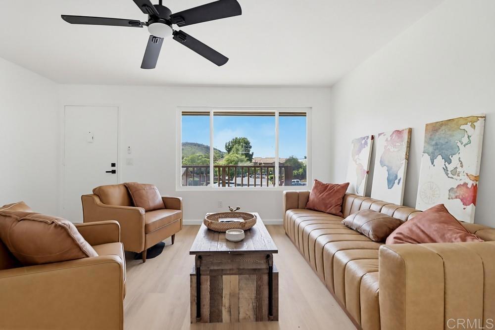 895 Jamacha Road El Cajon, CA 92019 - Photo 6 of 33 a living room with furniture and a large window