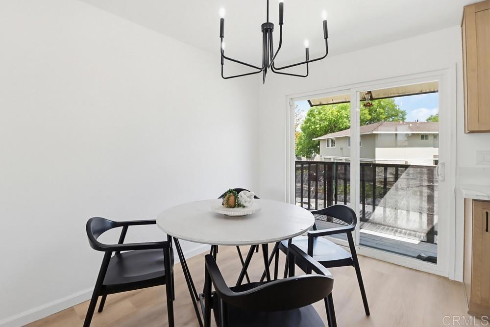 895 Jamacha Road El Cajon, CA 92019 - Photo 9 of 33 a view of a dining room with furniture and a window