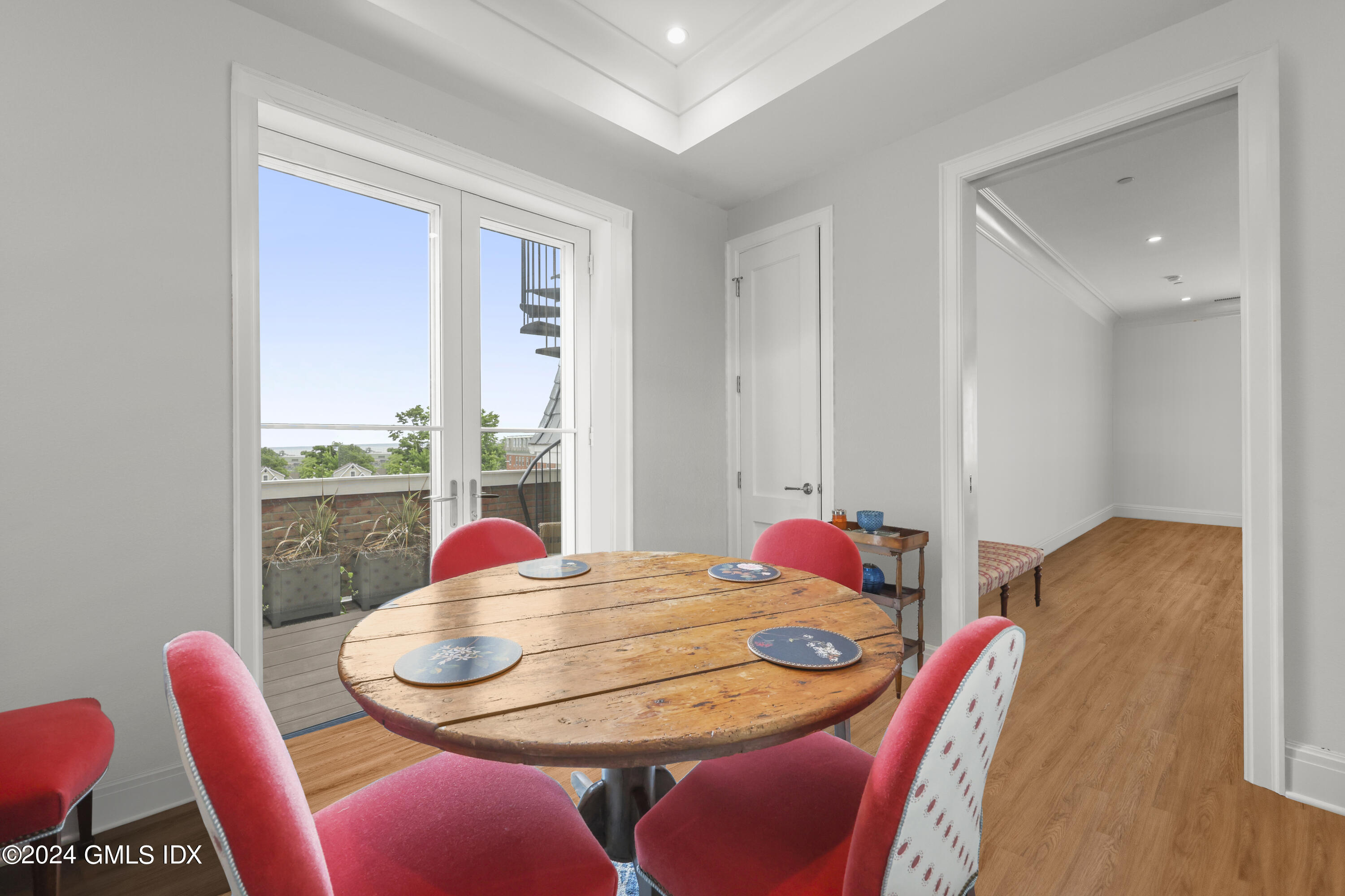 62 Mason Street, Unit PHW Greenwich, CT 06830 - Photo 11 of 18 a bedroom with furniture and a window