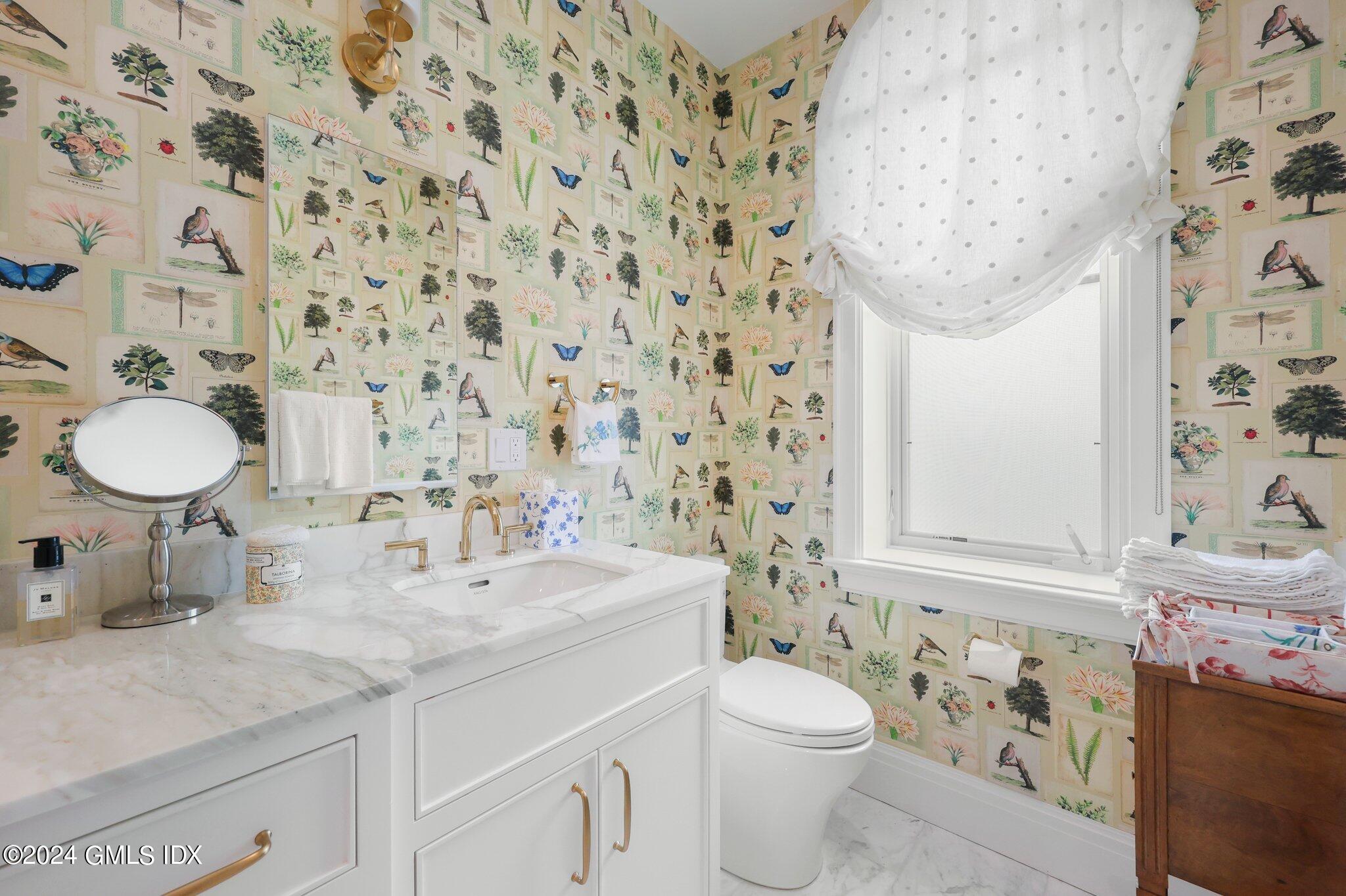 62 Mason Street, Unit PHW Greenwich, CT 06830 - Photo 14 of 18 a bathroom with a granite countertop sink and a mirror