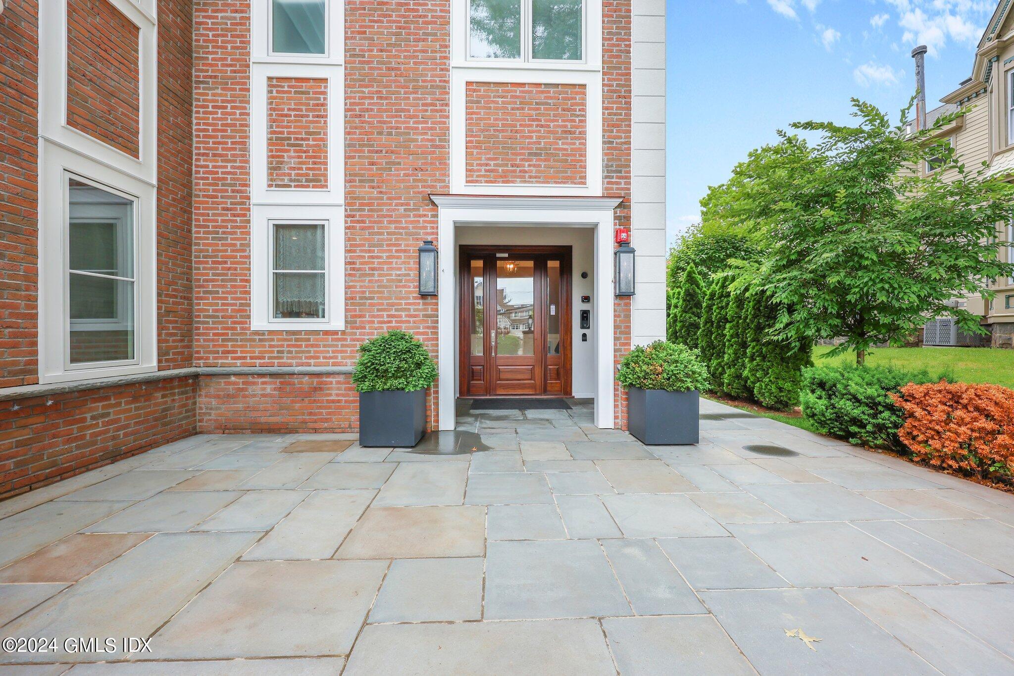 62 Mason Street, Unit PHW Greenwich, CT 06830 - Photo 3 of 18 a view of a house with outdoor space
