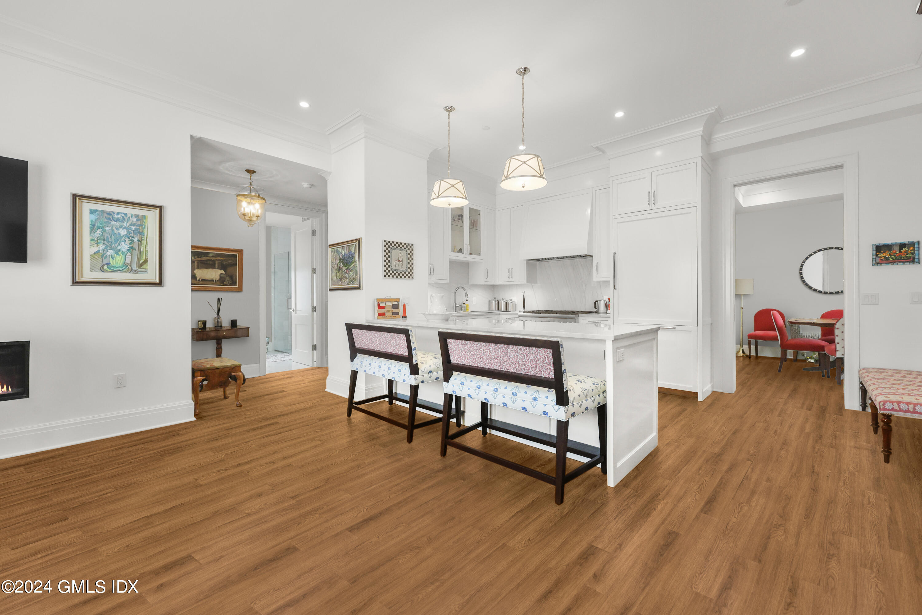62 Mason Street, Unit PHW Greenwich, CT 06830 - Photo 7 of 18 a living room with furniture and wooden floor