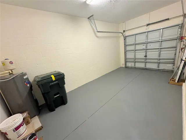 a view of a room with storage and utility room