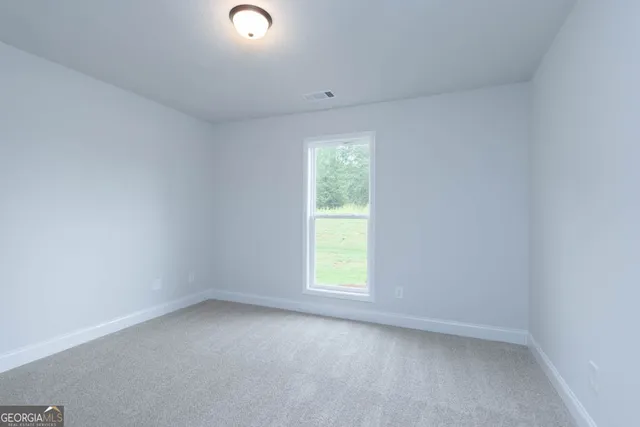 an empty room with a window