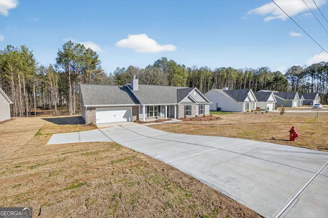 a view of a house with a swimming pool