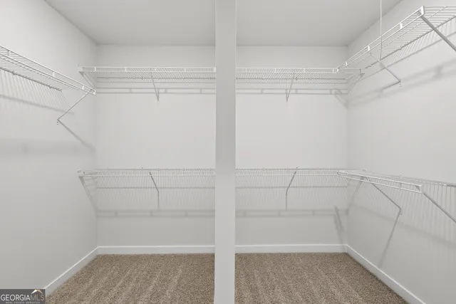 a view of a room with racks on the wall