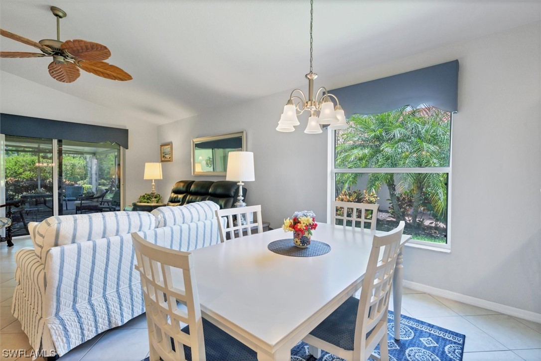 19654 Villa Rosa Loop Estero, FL 33967 - Photo 10 of 37 a view of a dining room with furniture window and outside view