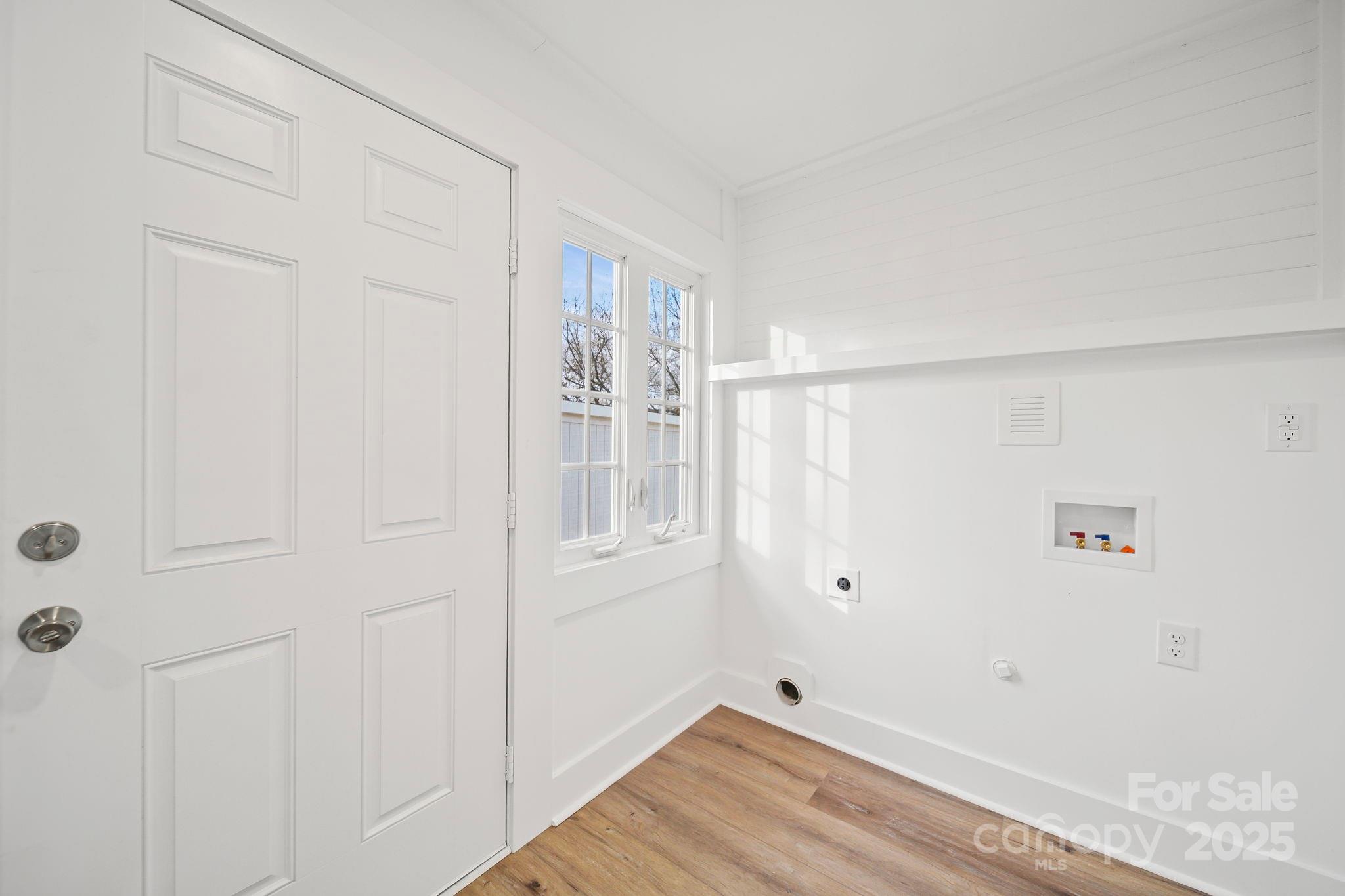 1703 Lowder Street Albemarle, NC 28001 - Photo 15 of 31 a view of room with wooden floor