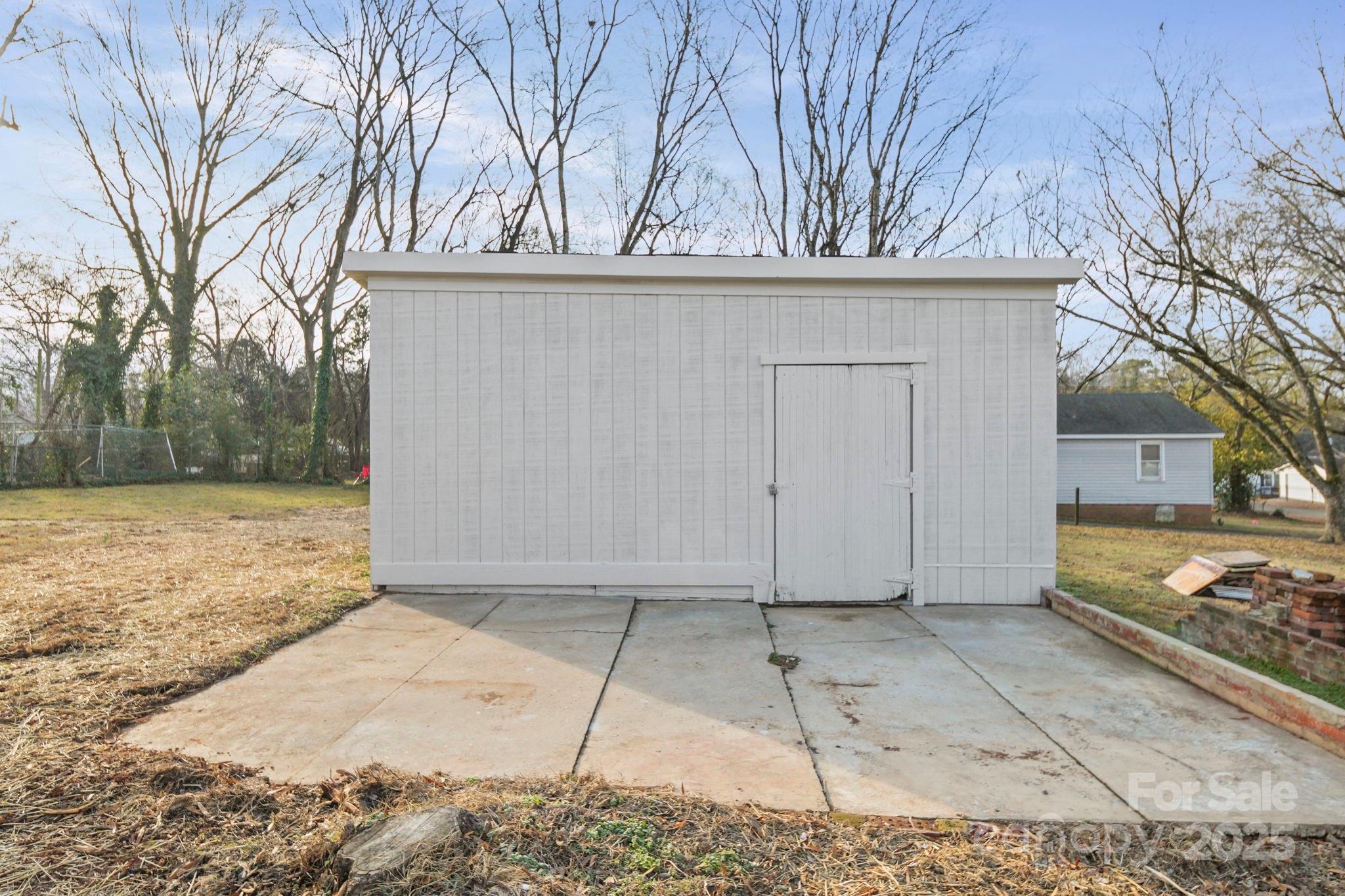 1703 Lowder Street Albemarle, NC 28001 - Photo 27 of 31 a view of a house with a snow on the road
