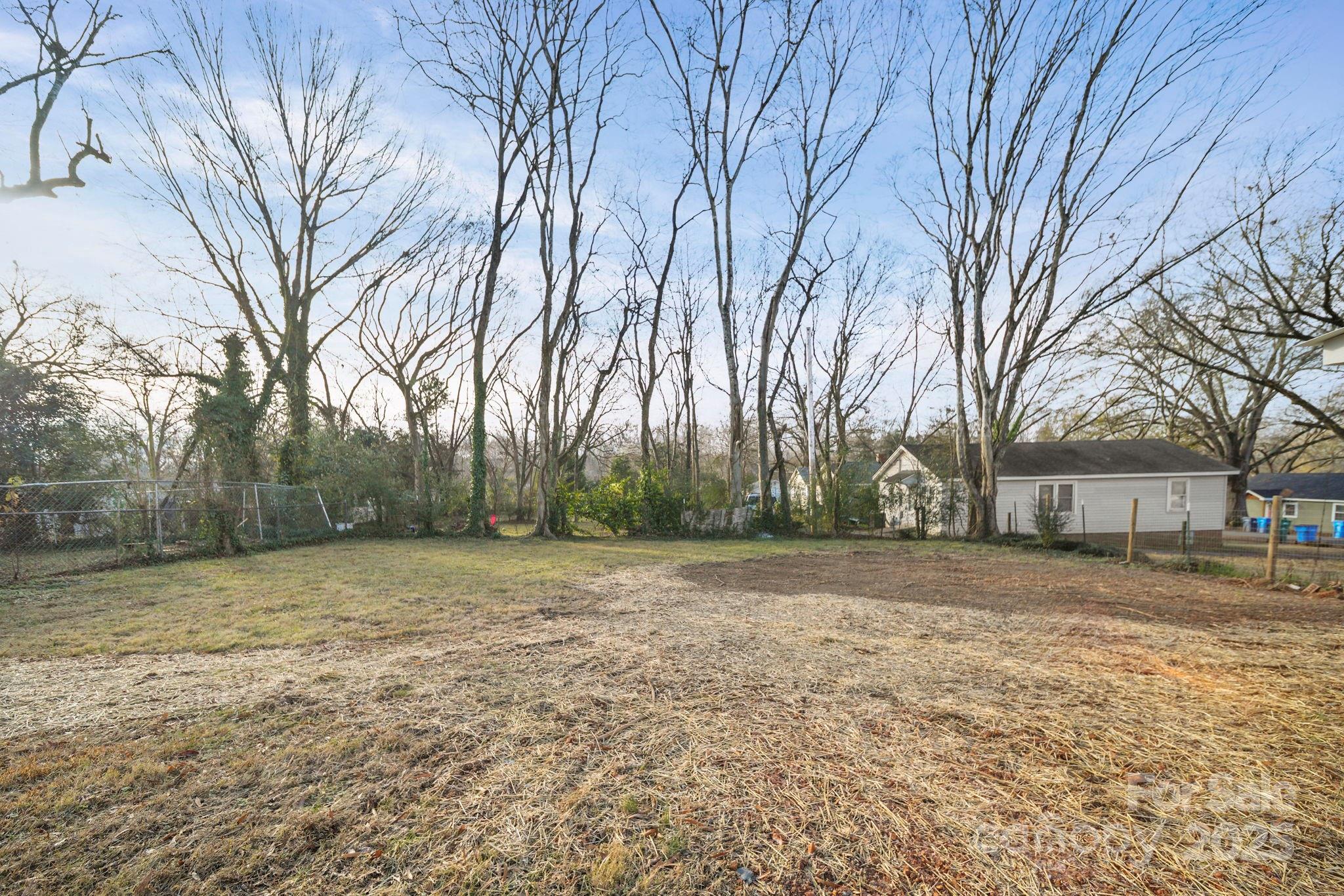 1703 Lowder Street Albemarle, NC 28001 - Photo 28 of 31 a view of a yard with a house