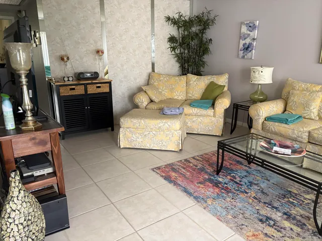 a bathroom with a toilet and a shower curtain