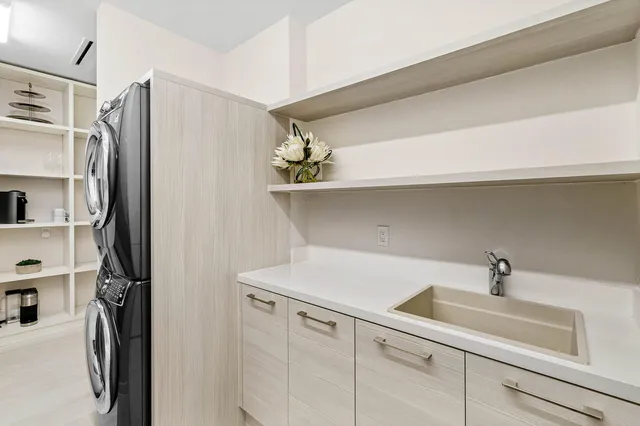 a utility room with cabinets