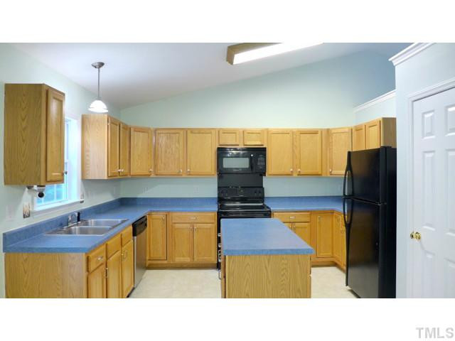 1819 Stage Road Durham, NC 27703 - Photo 4 of 14 The wonderful Kitchen is sure to please! Tremendous counter and cabinet space, large center island, new oven, and more.