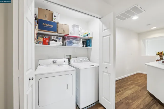 a utility room with dryer and washer