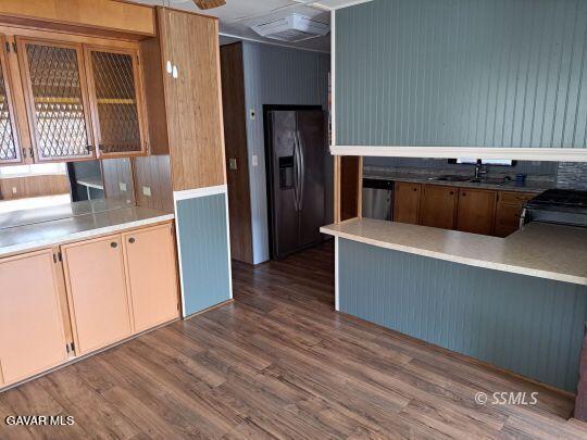 35 Evans Road Wofford Heights, CA 93285 - Photo 4 of 9 a kitchen with stainless steel appliances a sink cabinets and wooden floor