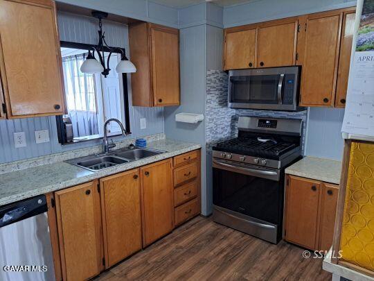 35 Evans Road Wofford Heights, CA 93285 - Photo 5 of 9 a kitchen with granite countertop a sink stove and microwave