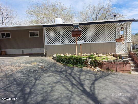 35 Evans Road Wofford Heights, CA 93285 - Photo 9 of 9 a front view of a house with a yard