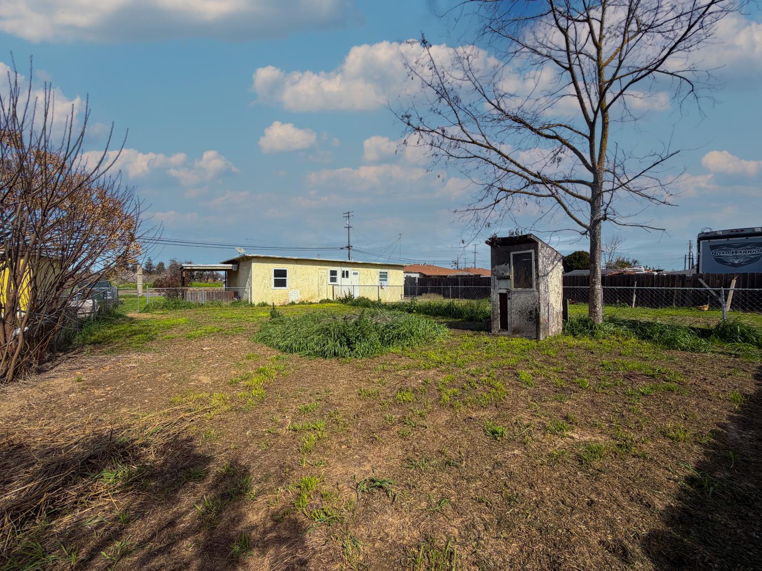 1630 Paradise Road Modesto, CA 95358 - Photo 1 of 42 a front view of a house with a yard and garage
