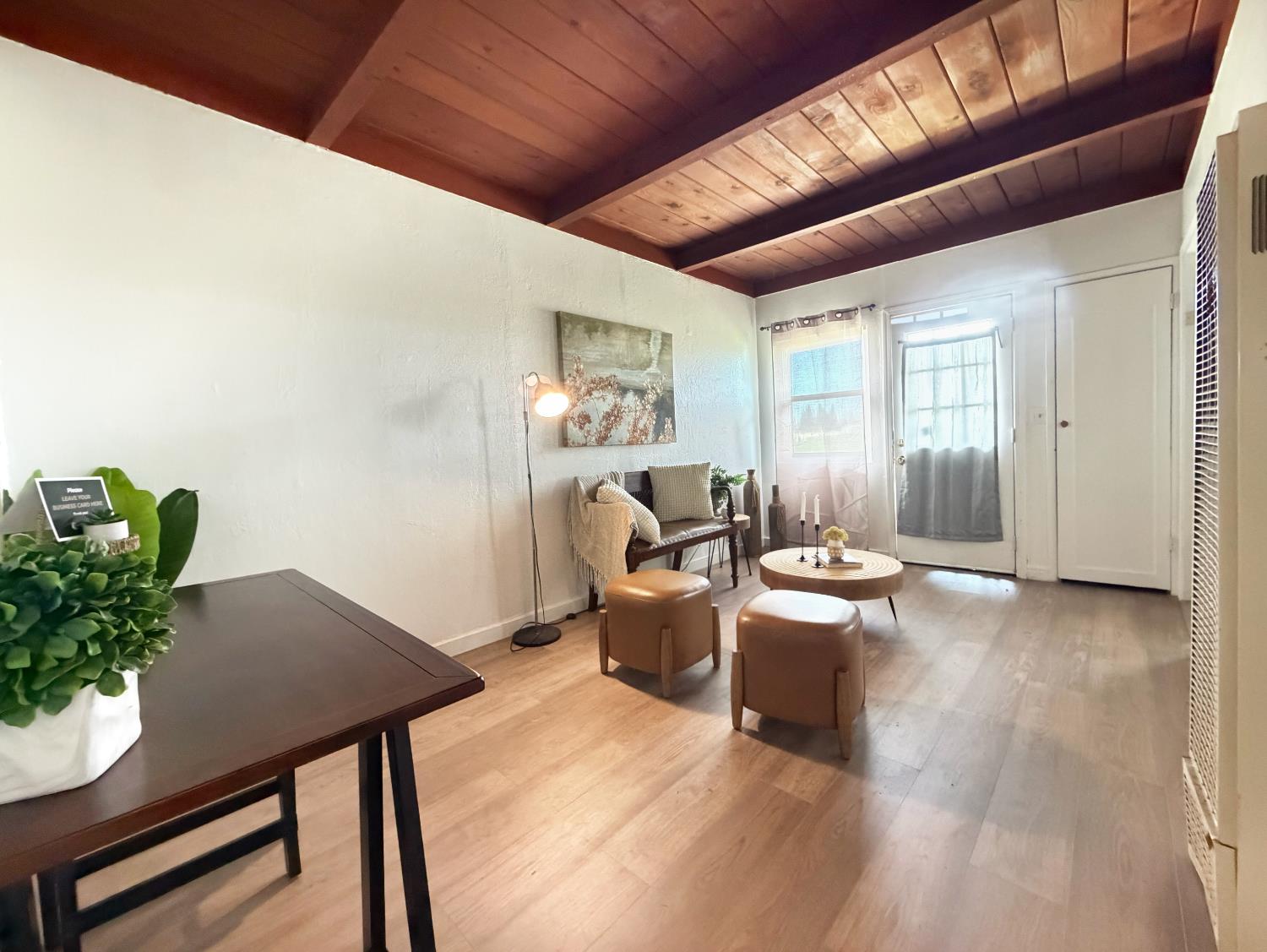 1630 Paradise Road Modesto, CA 95358 - Photo 12 of 42 a living room with furniture and a table