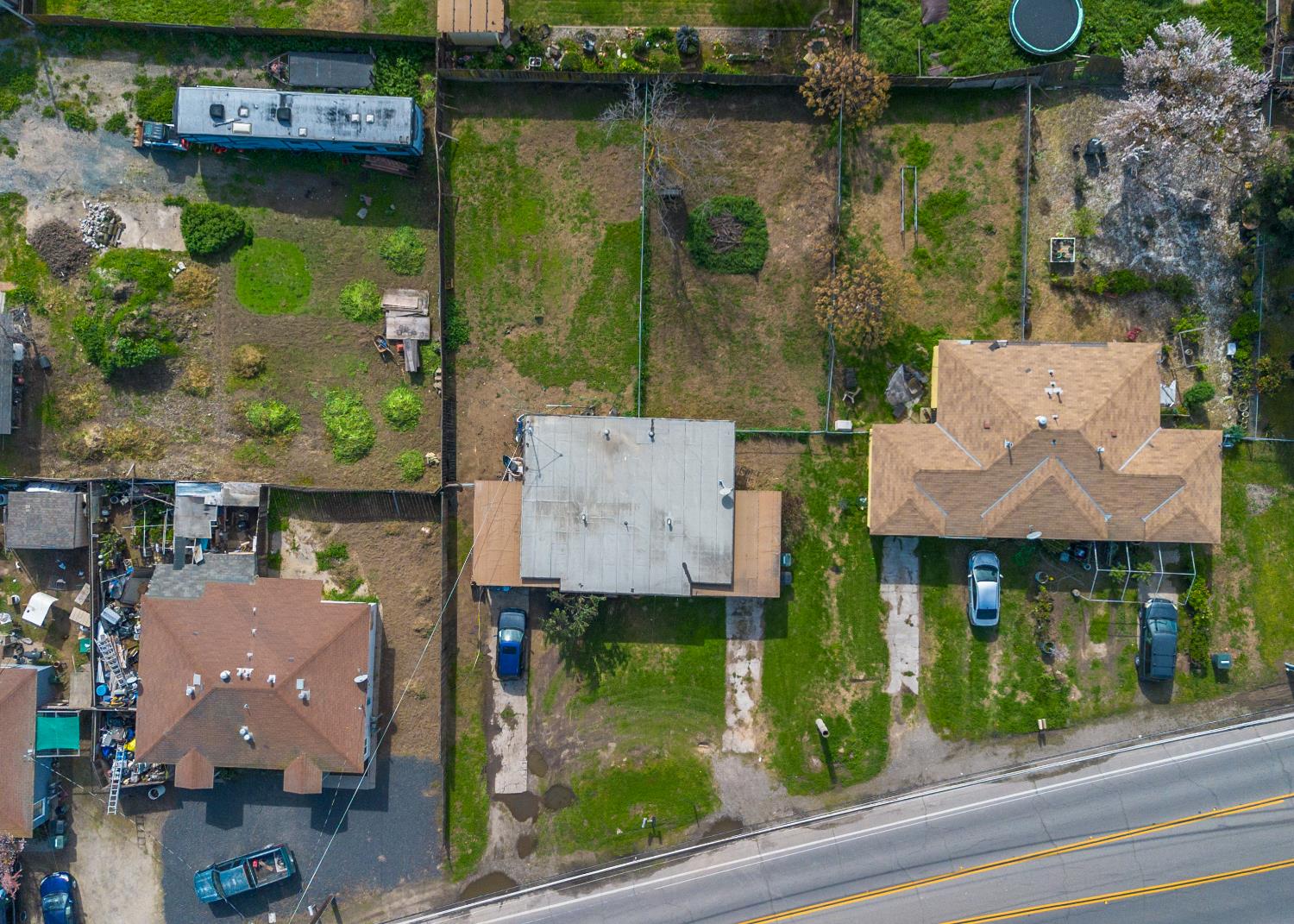 1630 Paradise Road Modesto, CA 95358 - Photo 36 of 42 an aerial view of residential houses with outdoor space and lake view