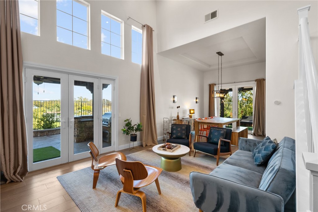 25742 Lewis Way Stevenson Ranch, CA 91381 - Photo 12 of 66 a living room with furniture and a large window
