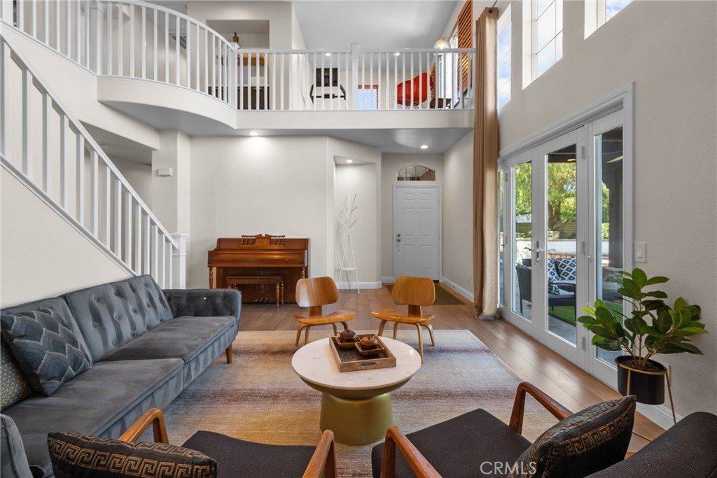 25742 Lewis Way Stevenson Ranch, CA 91381 - Photo 17 of 66 a living room with furniture and a large window