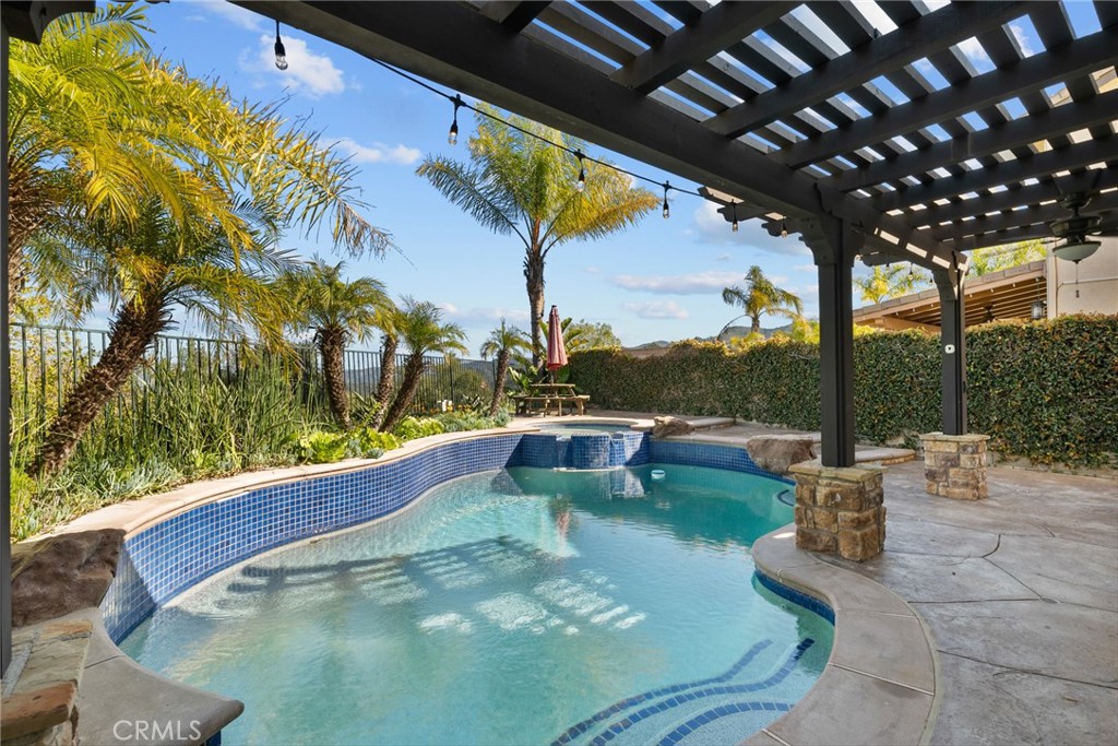 25742 Lewis Way Stevenson Ranch, CA 91381 - Photo 3 of 66 a view of swimming pool with a patio