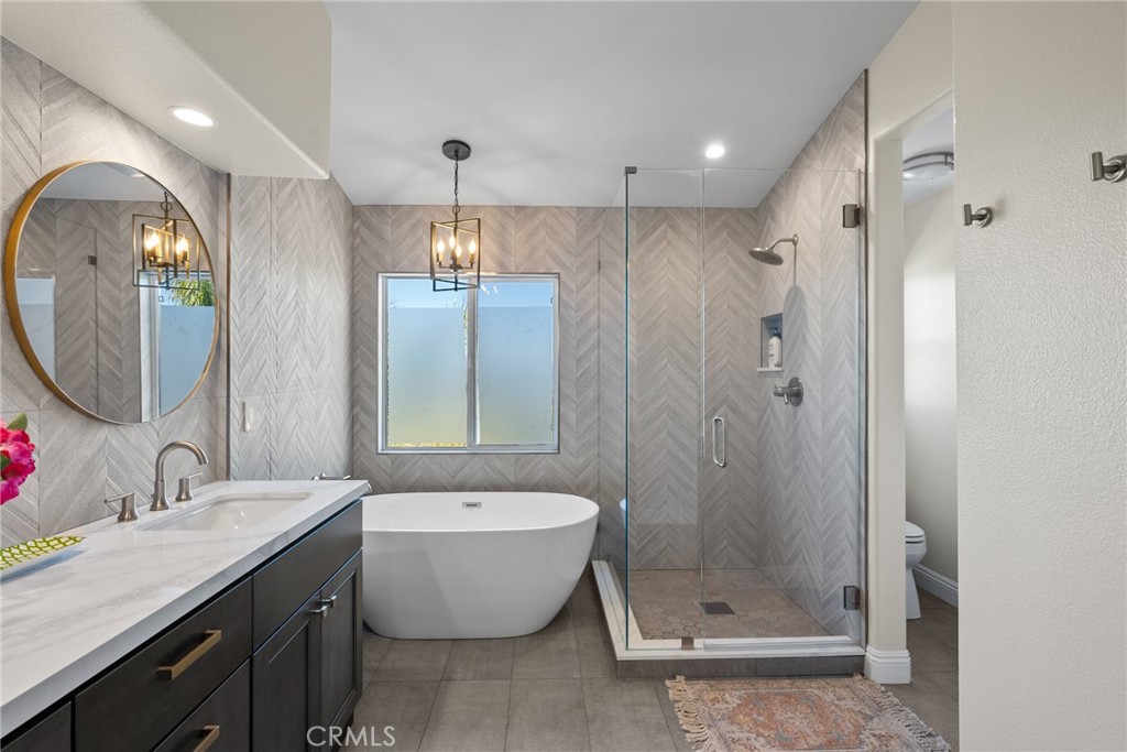25742 Lewis Way Stevenson Ranch, CA 91381 - Photo 33 of 66 a bathroom with a double vanity sink mirror double and shower