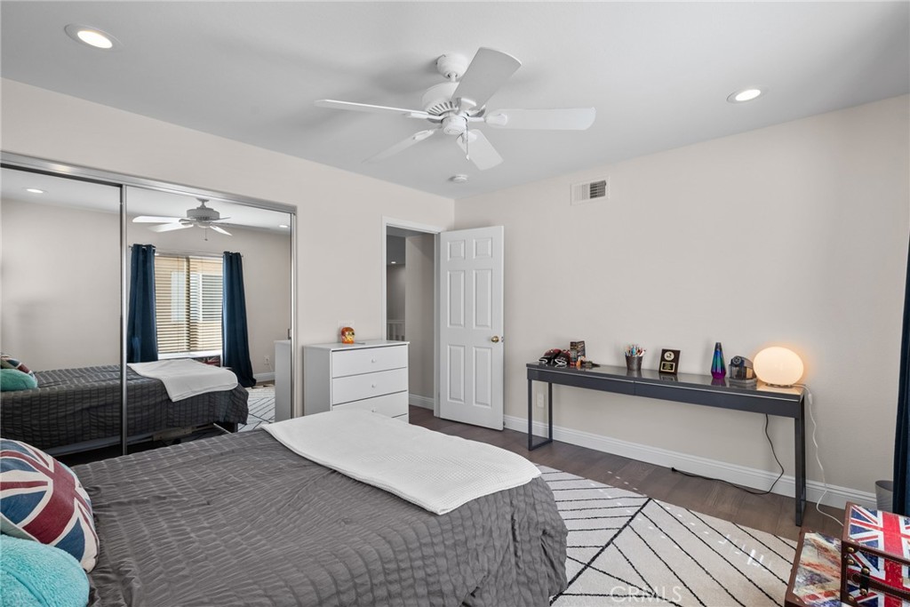 25742 Lewis Way Stevenson Ranch, CA 91381 - Photo 39 of 66 a living room with furniture and a chandelier