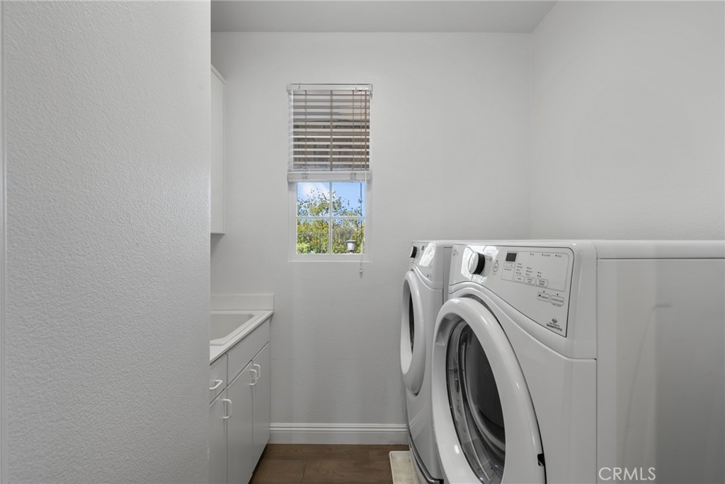 25742 Lewis Way Stevenson Ranch, CA 91381 - Photo 51 of 66 a utility room with dryer and washer