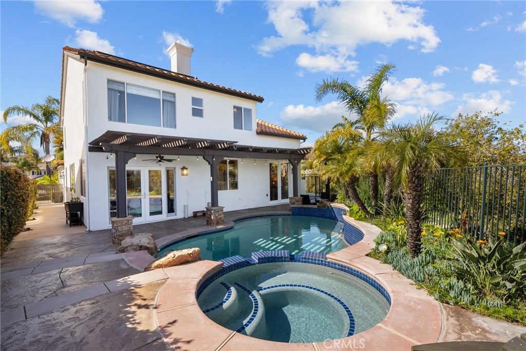25742 Lewis Way Stevenson Ranch, CA 91381 - Photo 55 of 66 a front view of a house with swimming pool
