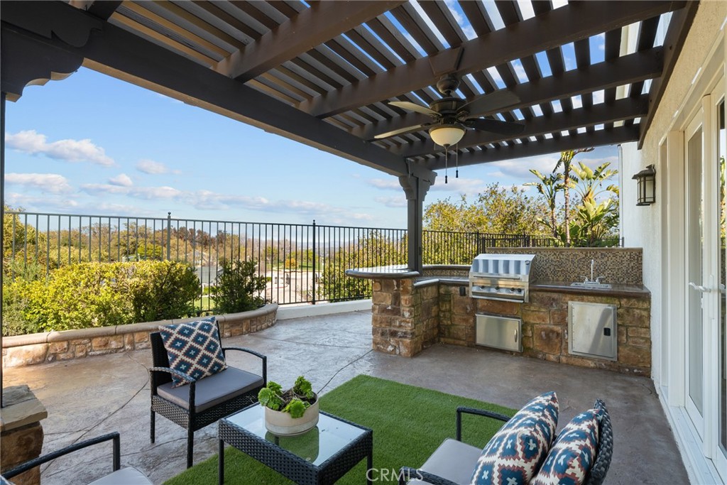 25742 Lewis Way Stevenson Ranch, CA 91381 - Photo 58 of 66 a view of a porch with furniture and a yard