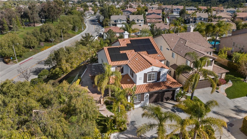 25742 Lewis Way Stevenson Ranch, CA 91381 - Photo 61 of 66 an aerial view of a house with a garden