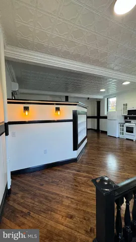 a view of a living room and dining room