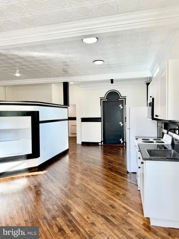 a view of hall way with mirror