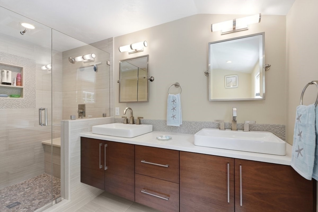 47 Old Coach Road Cohasset, MA 02025 - Photo 22 of 40 a bathroom with a sink vanity granite and a mirror