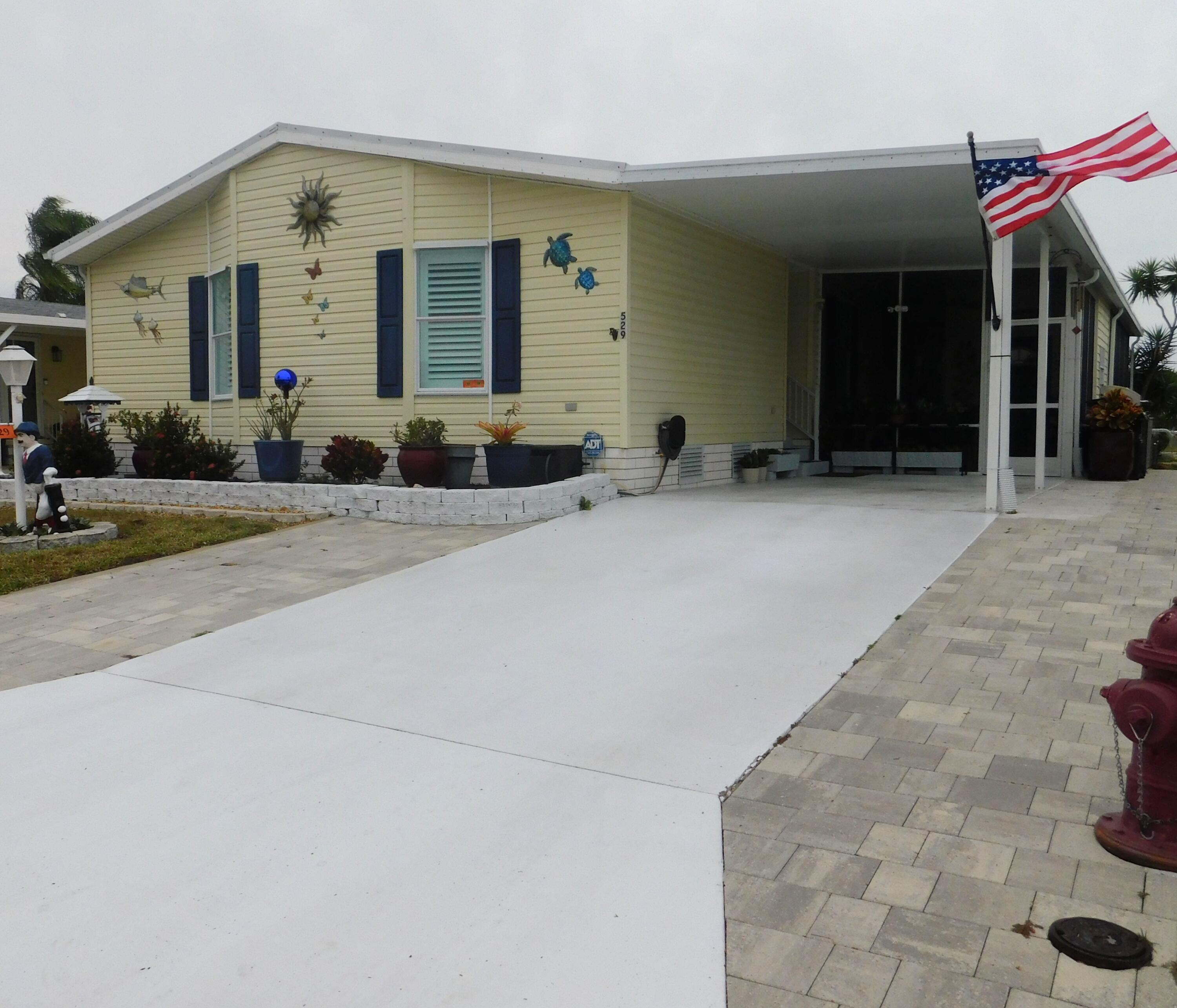 a front view of house with yard